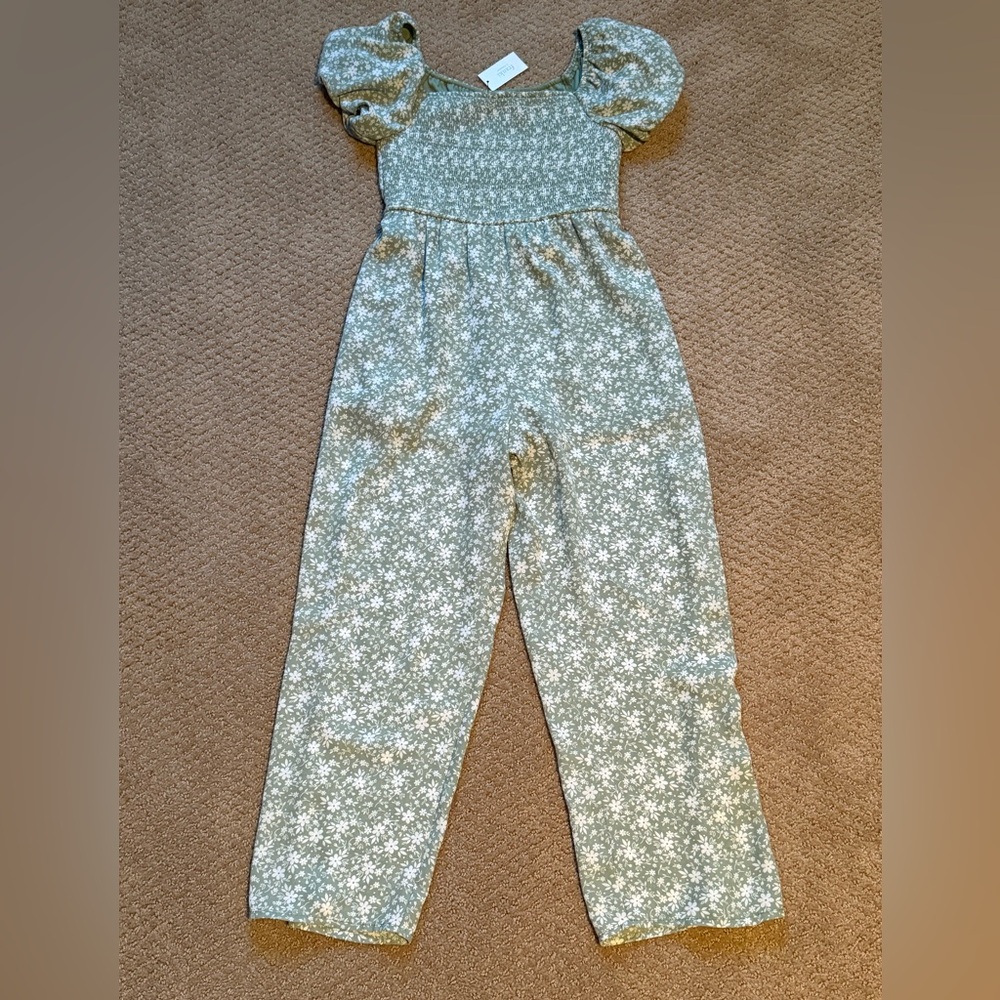 New with tag. Girls jumpsuit. Size youth small.